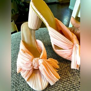 Pink open toe pleated bow heels